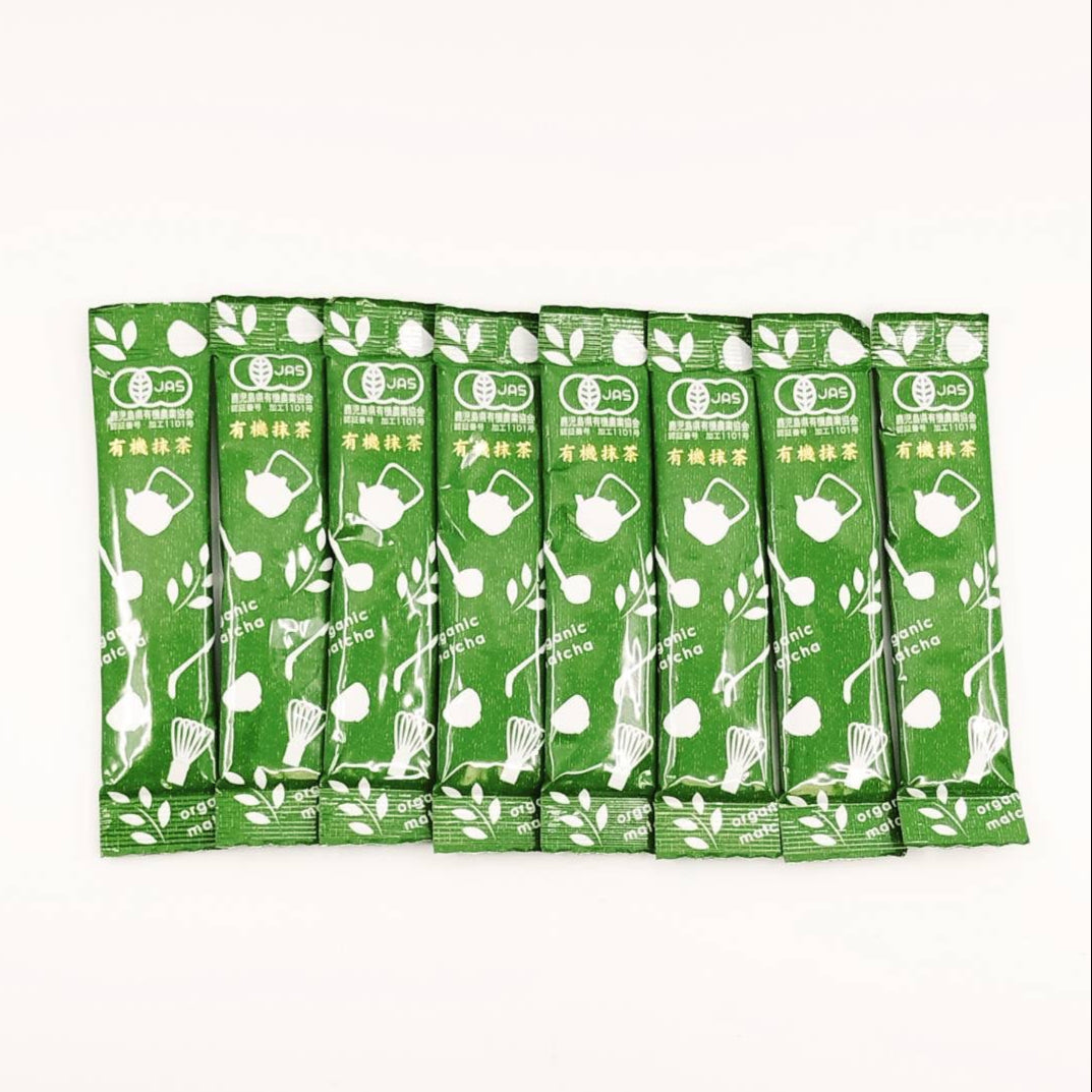 Set of green tea packages with white graphics on a white background